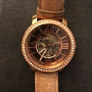 Tan and gold Fossil watch